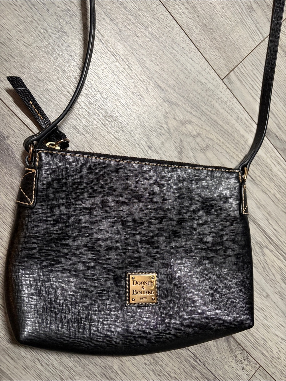 Dooney & Bourke Black Leather Crossbody with Gold Logo Plate